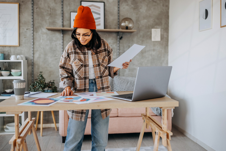 Designer reviewing materials for approval